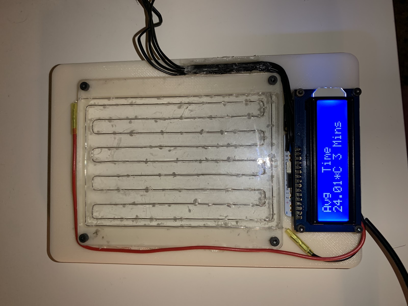 The fully assembled microplate heater, shown without a plate 96-well plate on top.